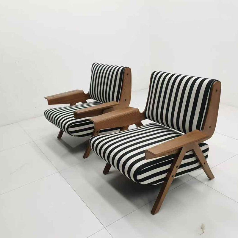 Modern striped cushioned sofa chair with wooden frame and armrests, providing stylish comfort for living rooms, offices, and hotels